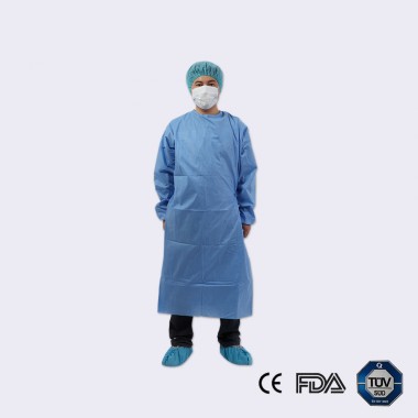 Disposable nonwoven reinforced surgical gown