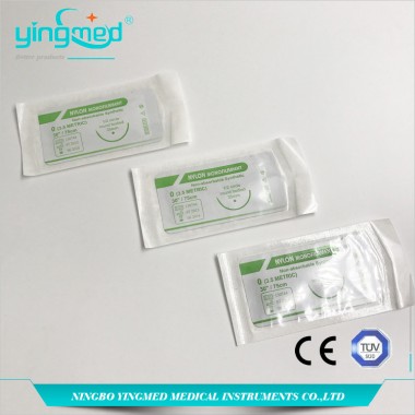 Disposable surgical suture with needle